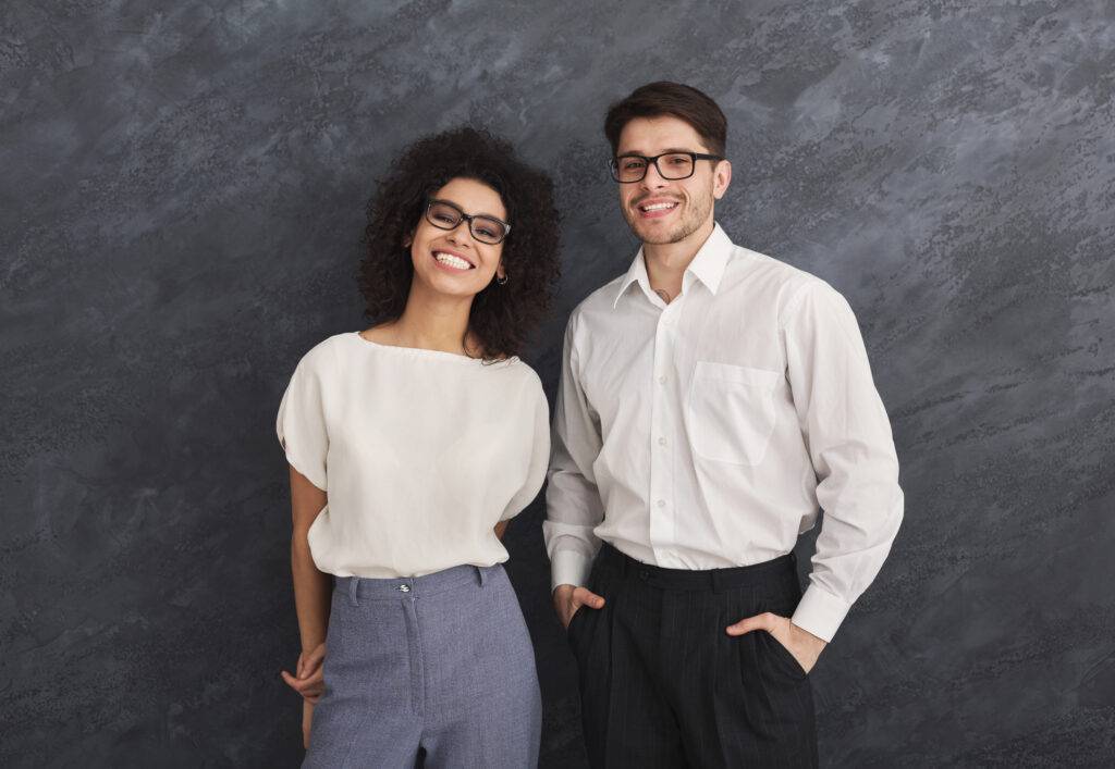 Young professional couple smiling