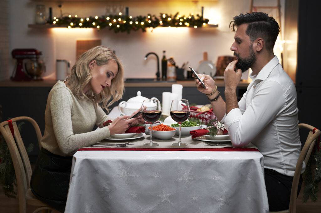 Couple sitting together but emotionally disconnected, illustrating lack of connection in marriage